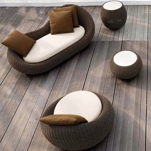 Close up of woven brown rattan material texture on modern outdoor patio furniture