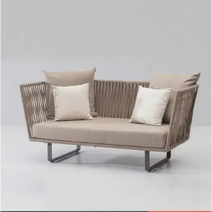 Close up of woven rattan texture on modern U-shape outdoor sofa set garden furniture