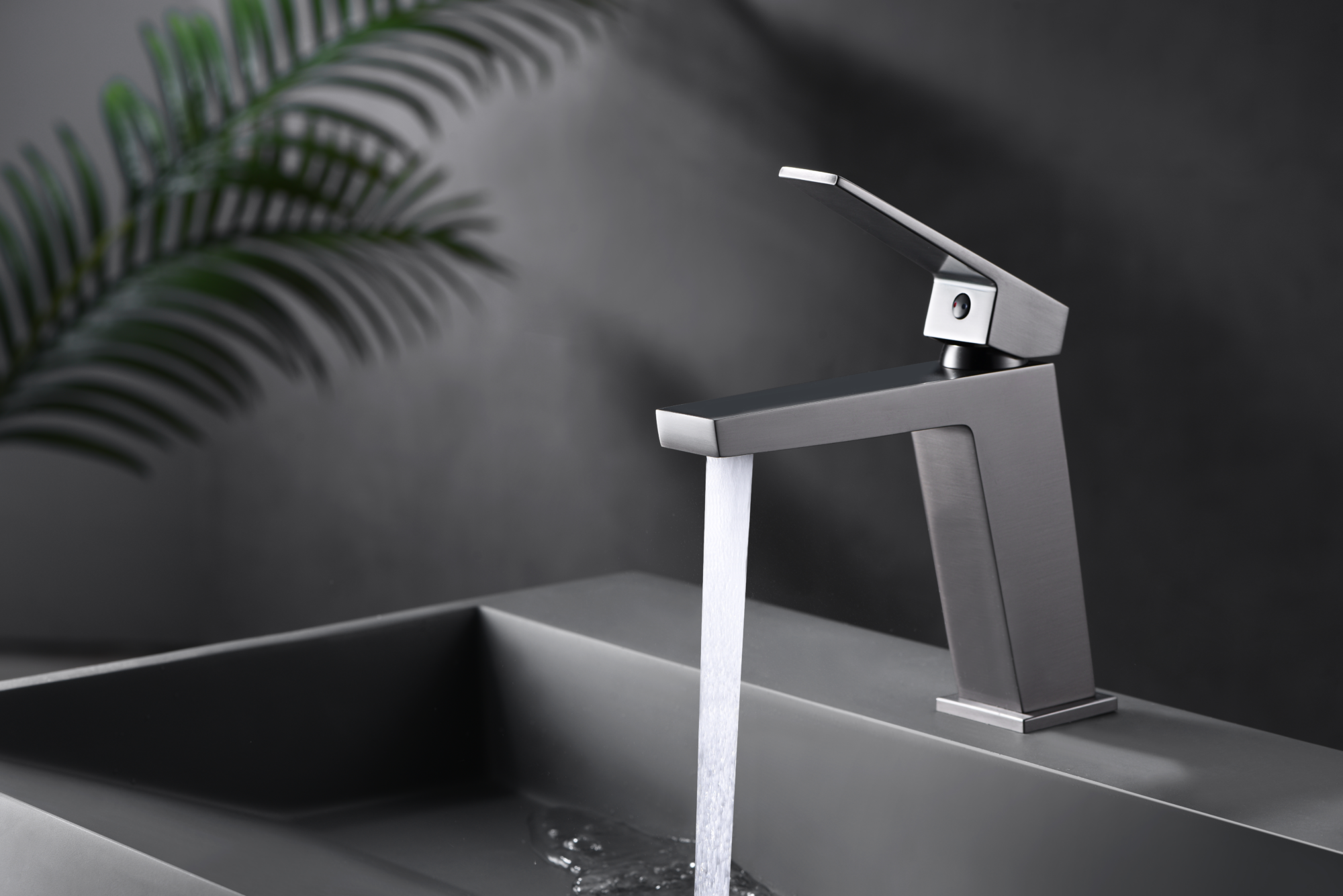 Black Gun Metal Single Handle Bathroom Faucet Modern Design, in a bathroom setting