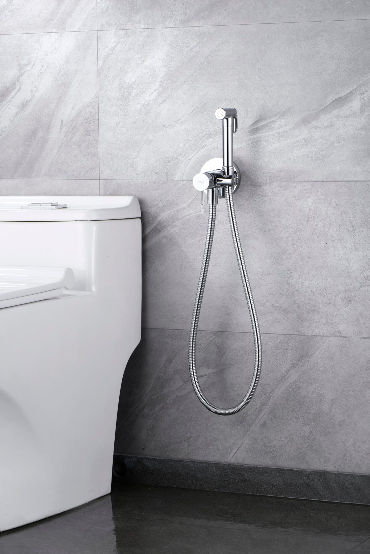 Chrome Built-in Bidet Faucet Modern Minimalist Design, in a bathroom setting