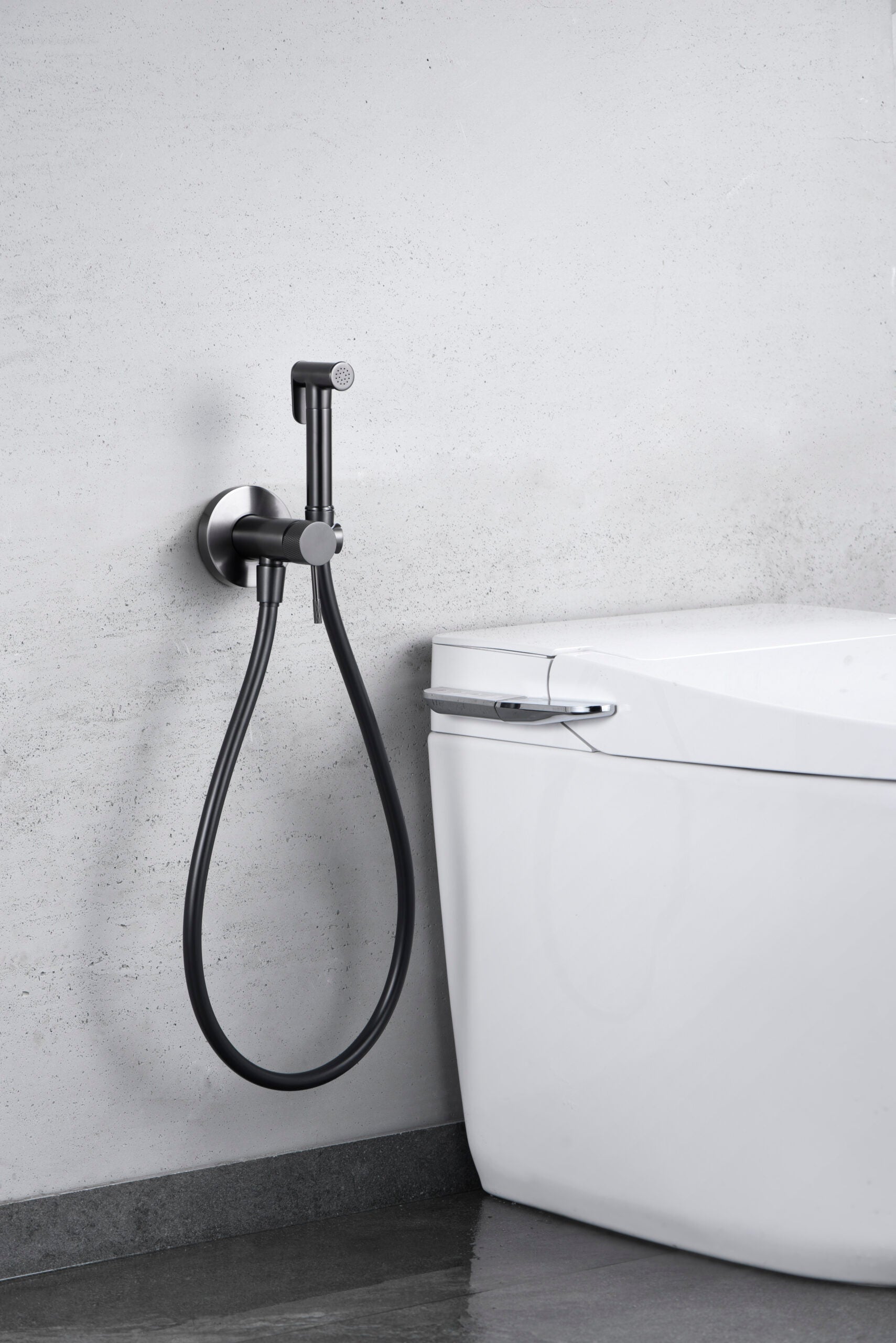Black Gun Metal Built-in Bidet Faucet Modern Design, in a bathroom setting