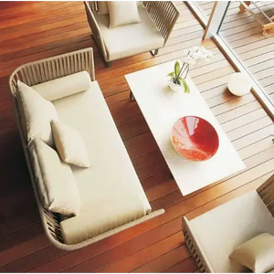 Close up detail of woven rattan texture on modern U-shape outdoor sofa set garden furniture