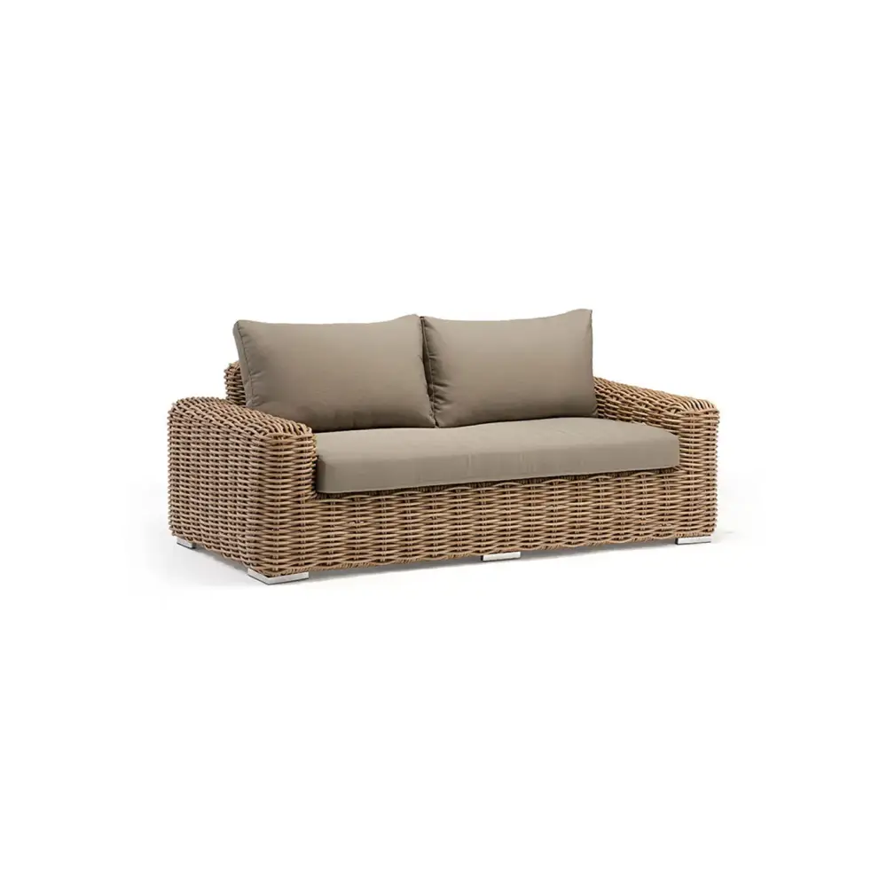 Close up of wicker rattan weave texture on outdoor patio sofa set showing material quality and craftsmanship detail