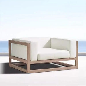 Close up of woven rattan material and durable aluminum frame on outdoor sectional sofa.