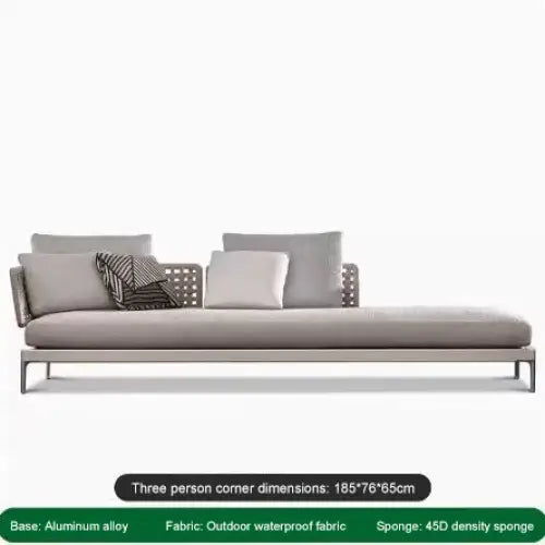 Close up of woven rattan texture and aluminum frame on modular outdoor sofa set cushioning detail