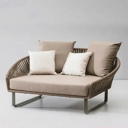 Close up of woven rattan texture on modern U-shape outdoor sofa set cushioning detail