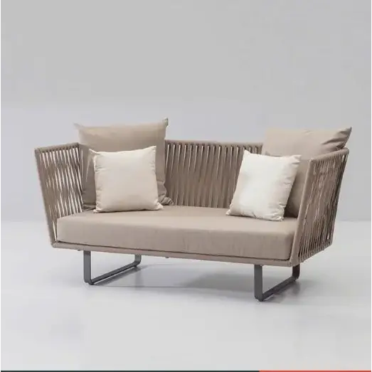Close up of woven rattan texture on modern U-shape outdoor sofa set garden furniture