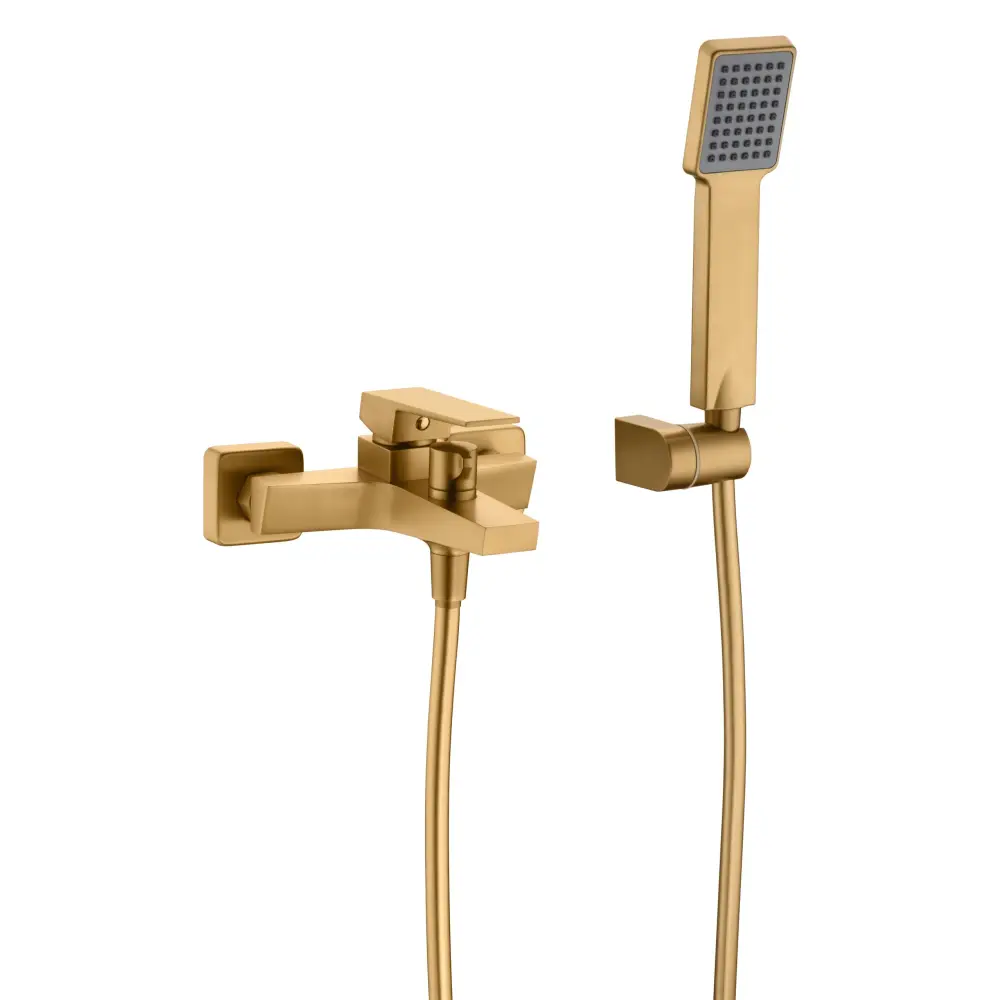 Brushed gold modern shower kit with single lever monomando on white background