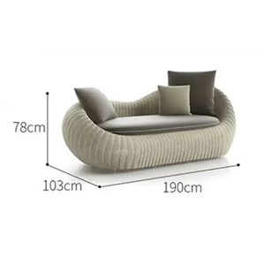Modern rattan garden sofa set showing close up woven texture detail in brown all weather material