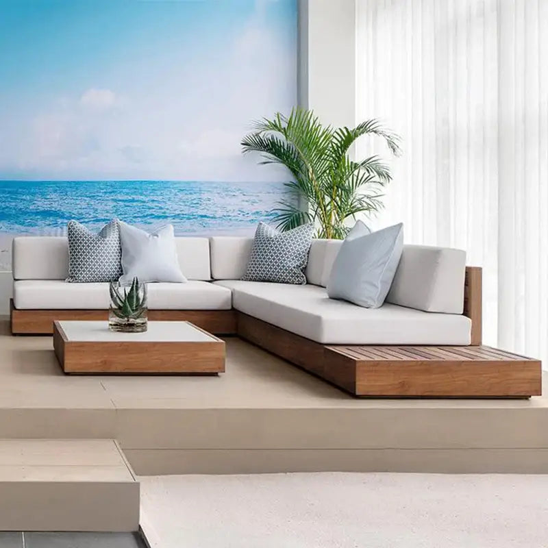 Modern teak outdoor sofa set showing natural wood grain and weather resistant material construction for patio furniture.