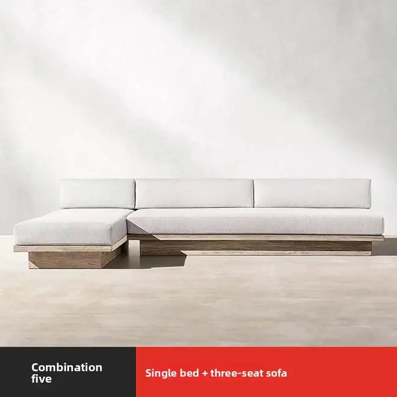 Teak outdoor sofa set showing waterproof cushion material and natural wood grain detail