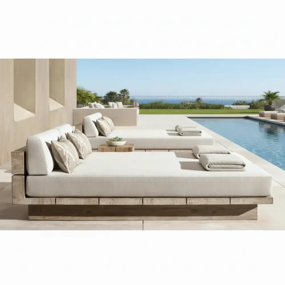 Teak outdoor sofa set with waterproof cushions arranged in full garden furniture configuration