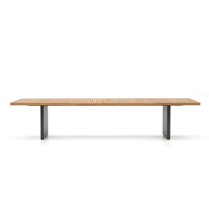 Teak wood grain detail on 8-seat outdoor dining set showing natural texture and durable material quality.