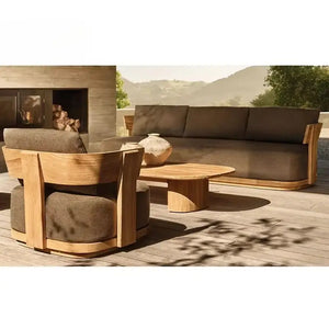 Teak wood outdoor sectional sofa showing dark gray modular cushions and contemporary design details